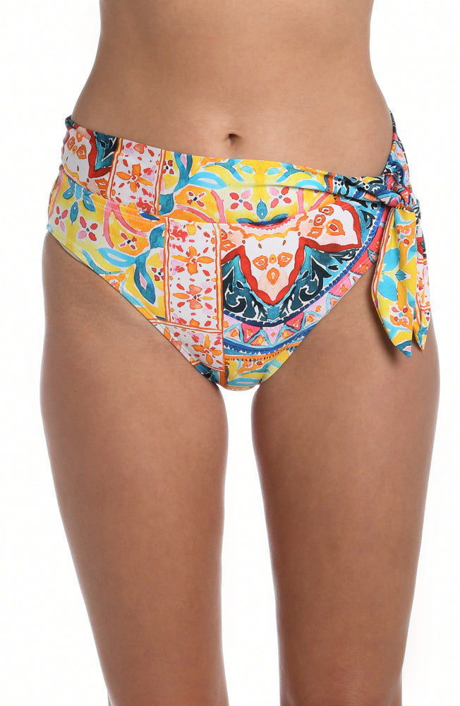 
            
                Load image into Gallery viewer, Model is wearing a moroccan inspired multi colored printed high waist bottom from our Soleil collection!
            
        