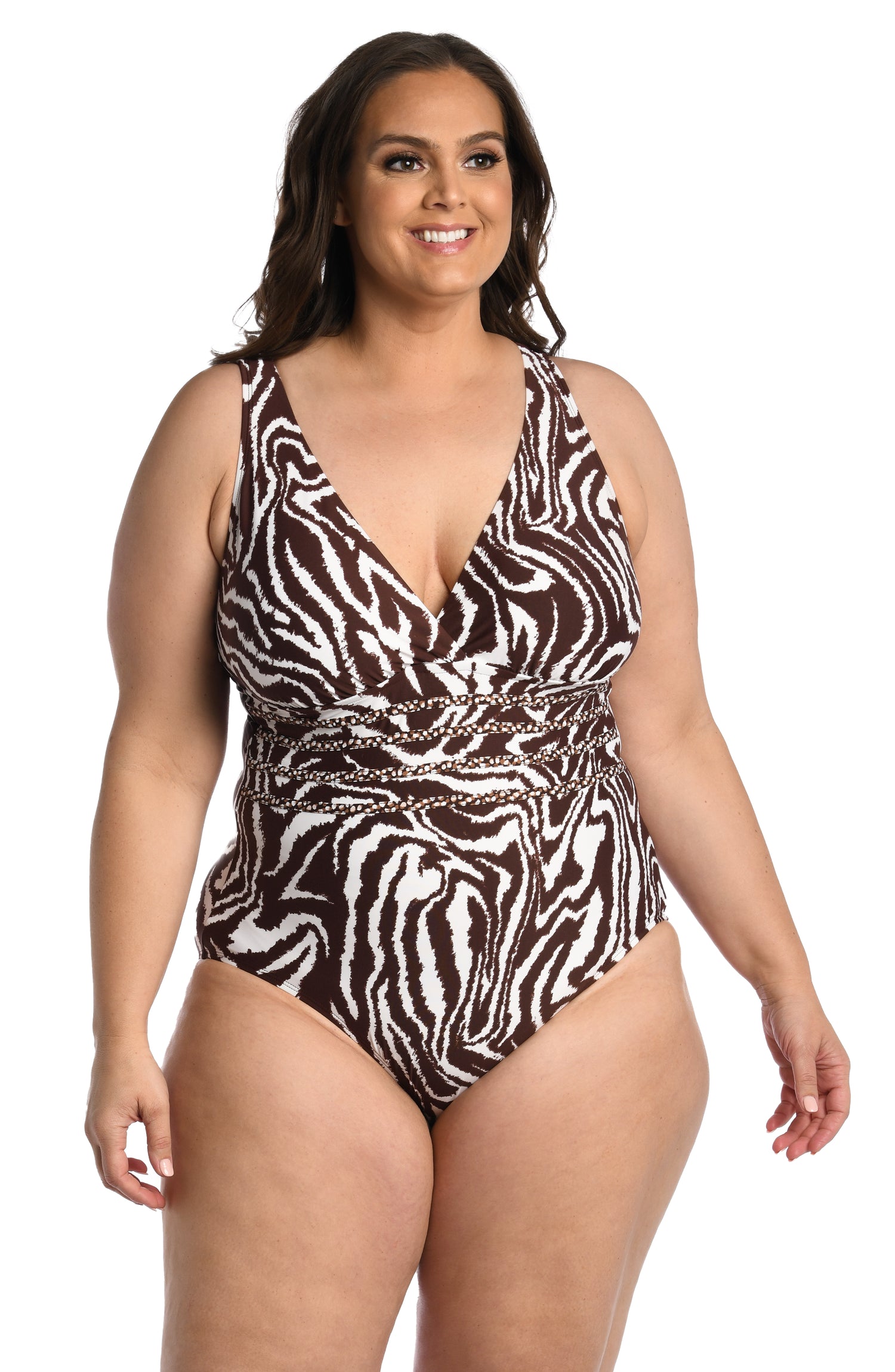 Model is wearing a java colored animal printed multi-strap crossback one piece in our Fierce Lines collection!