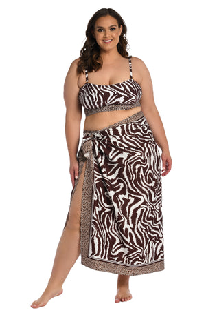 Model is wearing a java colored animal printed pareo wrap cover up in our Fierce Lines collection!