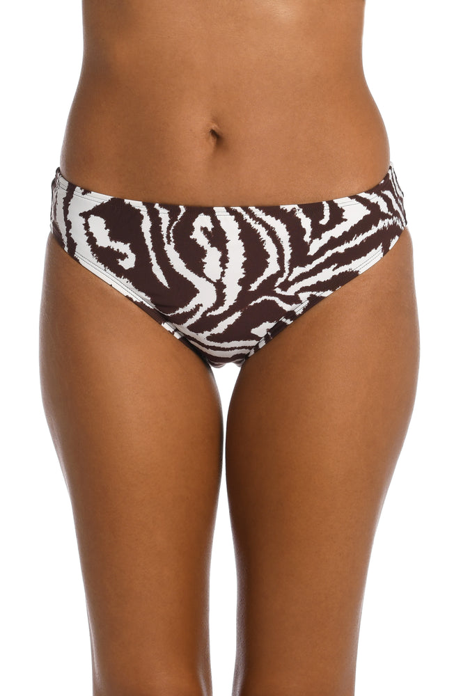 Model is wearing a java colored animal printed hipster bottom in our Fierce Lines collection!