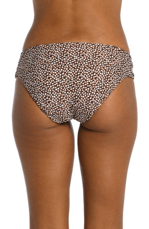 
            
                Load image into Gallery viewer, Model is wearing a java colored animal printed side shirred bottom in our Fierce Lines collection!
            
        