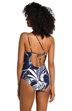 
            
                Load image into Gallery viewer, Model is wearing an indigo colored print with pops of white on this multi-strap crossback one piece from our At the Playa collection!
            
        