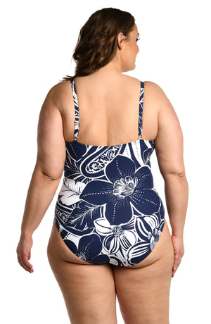Model is wearing an indigo colored print with pops of white on this lingerie one piece from our At the Playa collection!