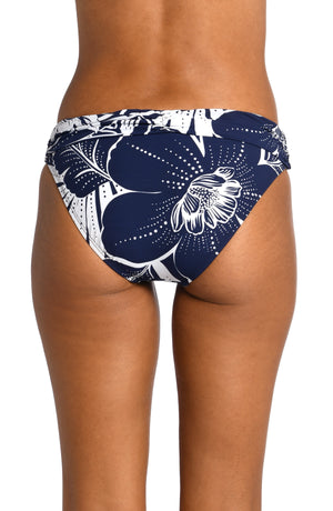 
            
                Load image into Gallery viewer, Model is wearing an indigo colored print with pops of white on shirred band hipster bottom from our At the Playa collection!
            
        