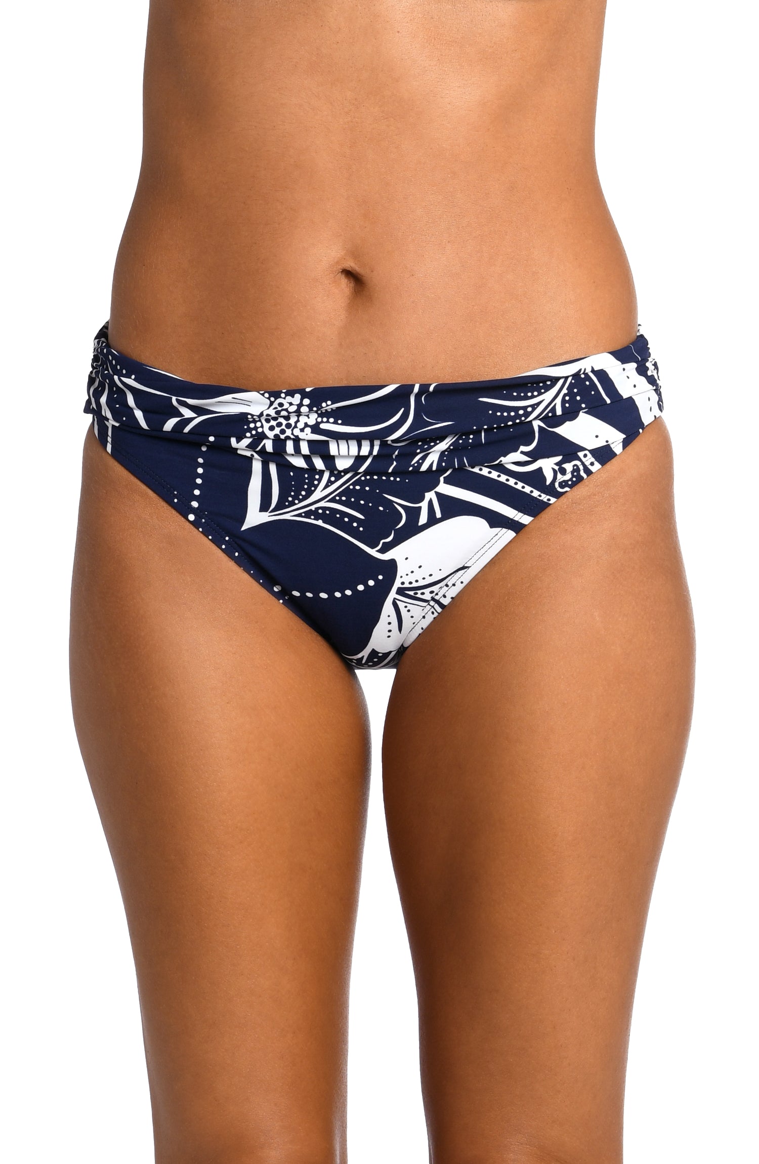 Model is wearing an indigo colored print with pops of white on shirred band hipster bottom from our At the Playa collection!
