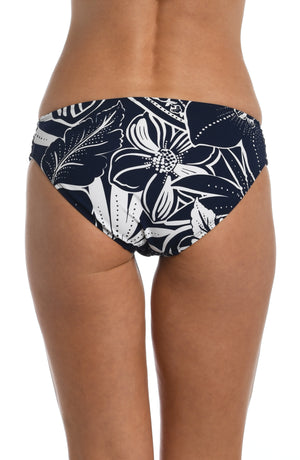 
            
                Load image into Gallery viewer, Model is wearing an indigo colored print with pops of white on shirred band hipster bottom from our At the Playa collection!
            
        