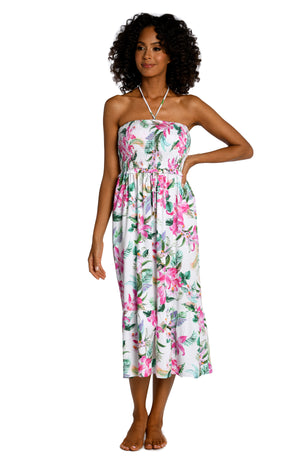 
            
                Load image into Gallery viewer, Model is wearing multi colored tropical print on a white backround with this strapless midi dress cover up from our Mystic Palms collection!
            
        