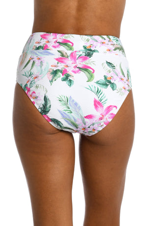 
            
                Load image into Gallery viewer, Model is wearing multi colored tropical print on a white backround with this high waist bottom from our Mystic Palms collection!
            
        