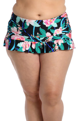 Model is wearing pink multi colored tropical foral print on this ruffle skirted bottom from our Nightfall Blooms collection!