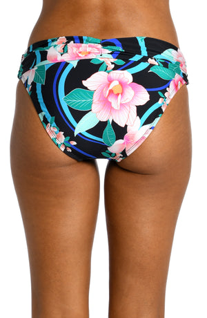 
            
                Load image into Gallery viewer, Model is wearing pink multi colored tropical foral print on this shirred band hipster from our Nightfall Blooms collection!
            
        