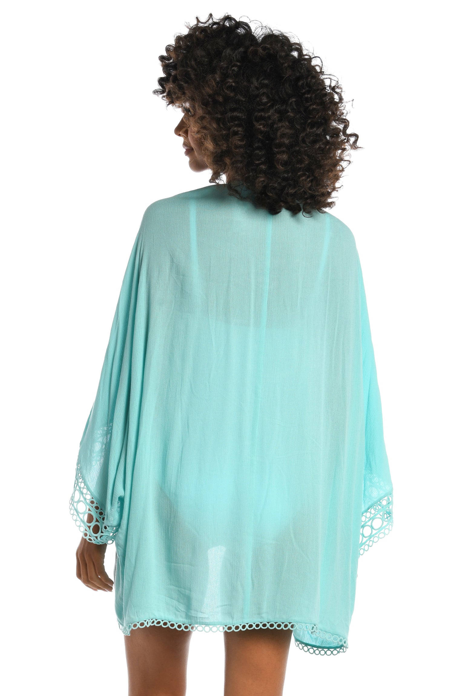 Model is wearing a ice blue colored crochet kimono cover up from our Illusion Covers collection!