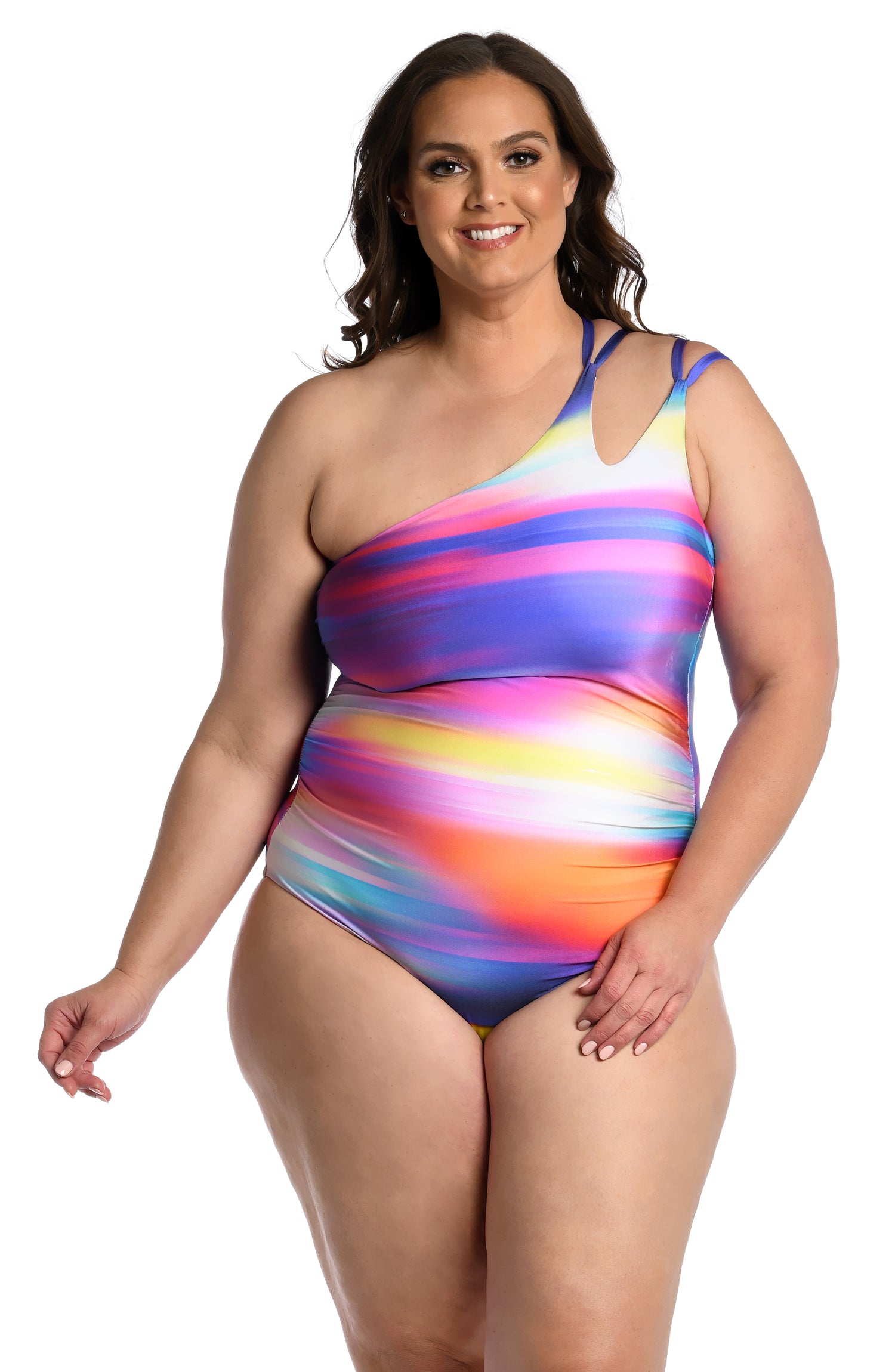 Model is wearing a multi colored ombre printed strappy one shoulder one piece from our Sunset Shores collection!