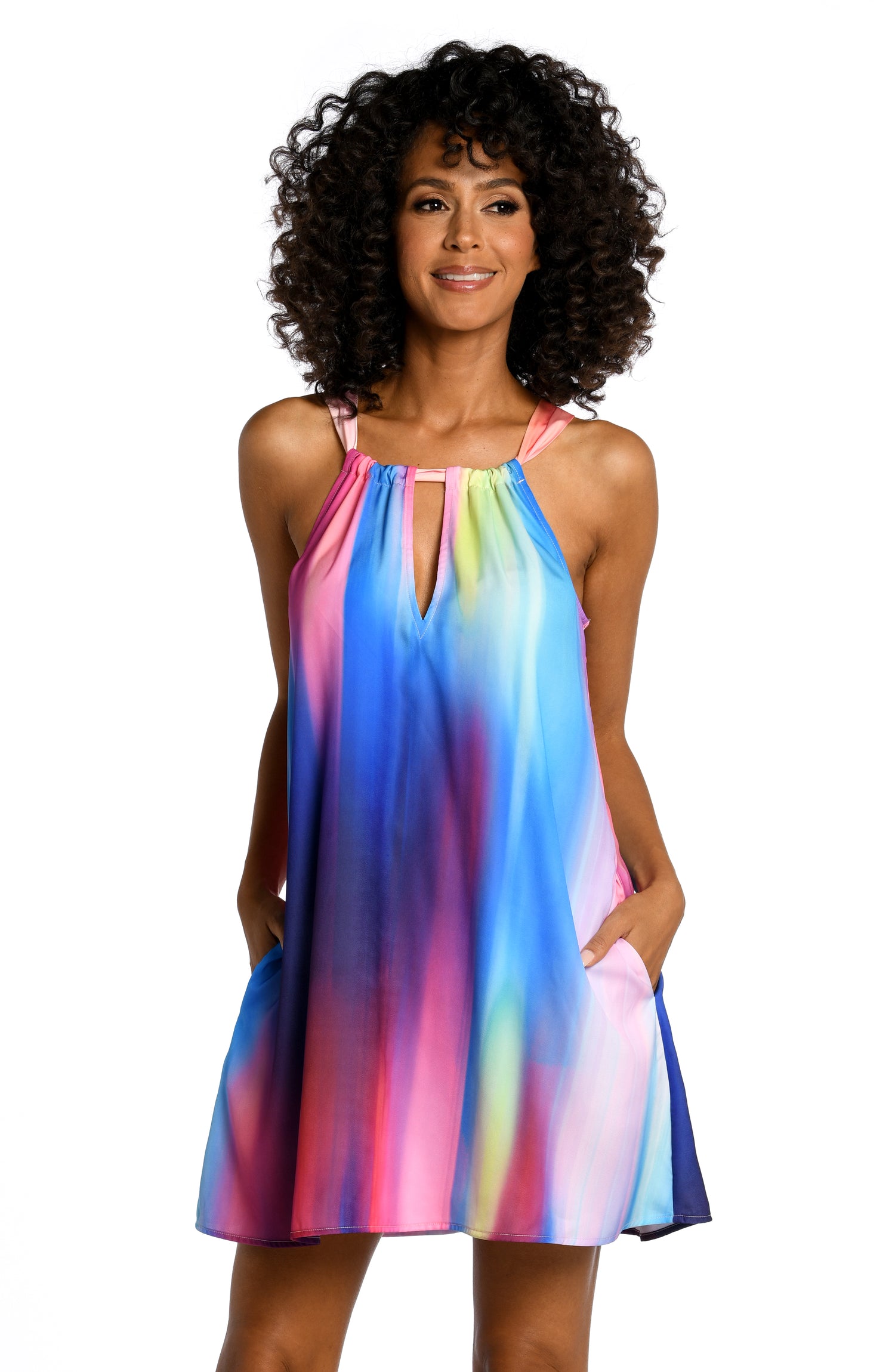 Model is wearing a multi colored ombre printed high neck mini dress cover up from our Sunset Shores collection!
