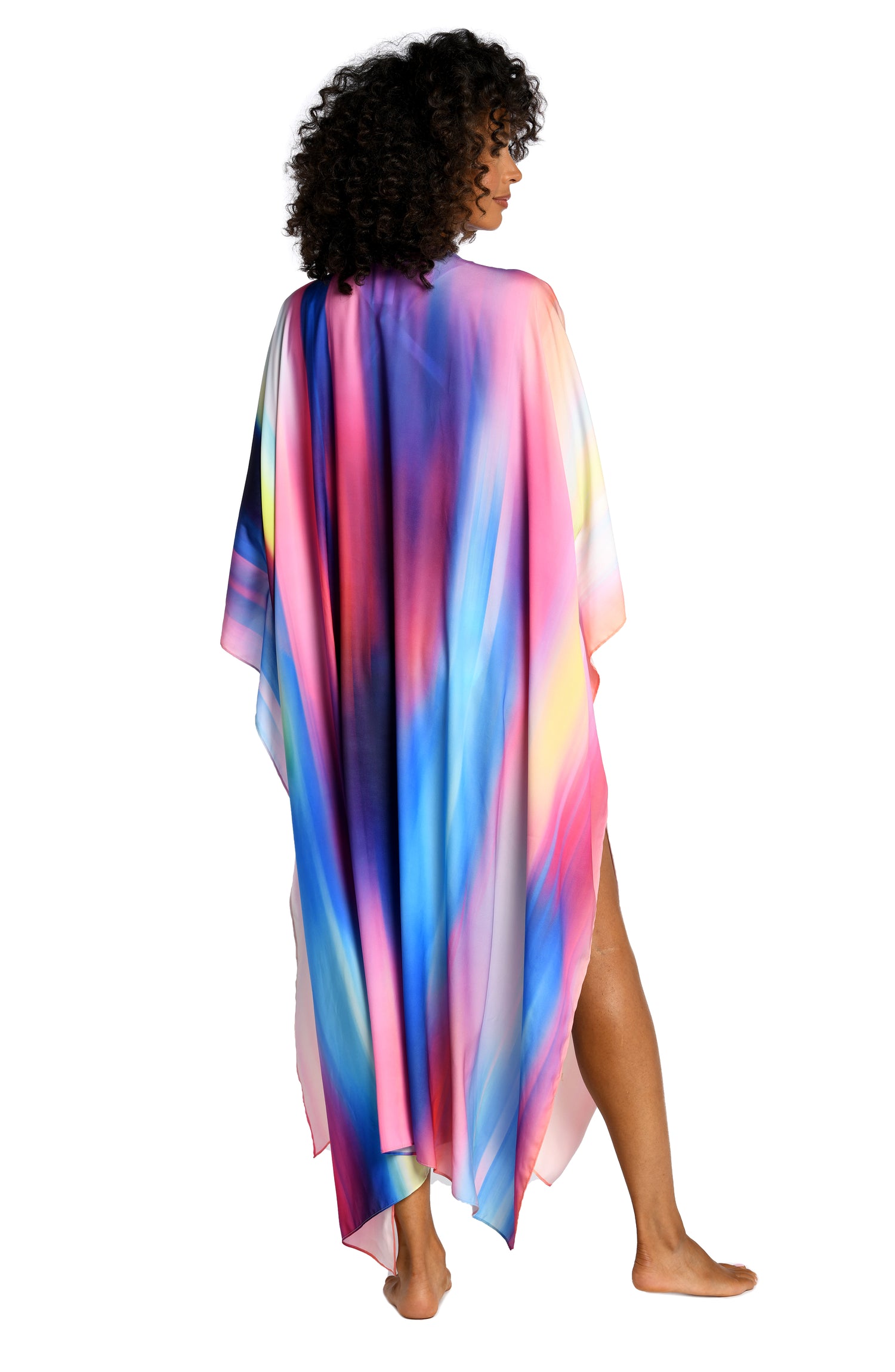 Model is wearing a multi colored ombre printed kimono cover up from our Sunset Shores collection!