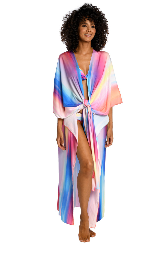 
            
                Load image into Gallery viewer, Model is wearing a multi colored ombre printed kimono cover up from our Sunset Shores collection!
            
        