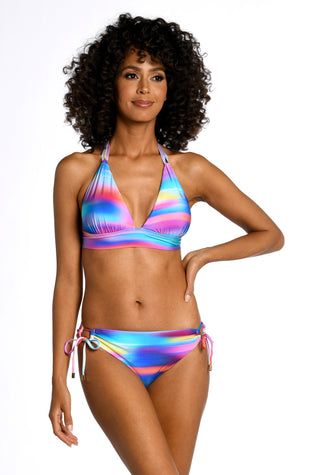 Model is wearing a multi colored ombre printed banded halter triangle top from our Sunset Shores collection!