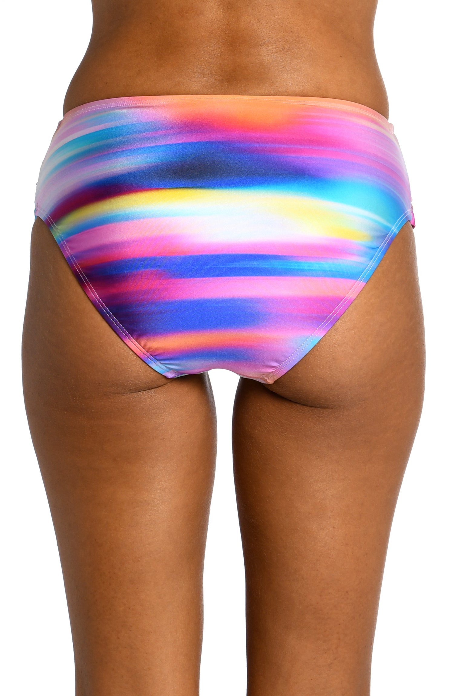 Model is wearing a multi colored ombre printed mid waist bottom from our Sunset Shores collection!