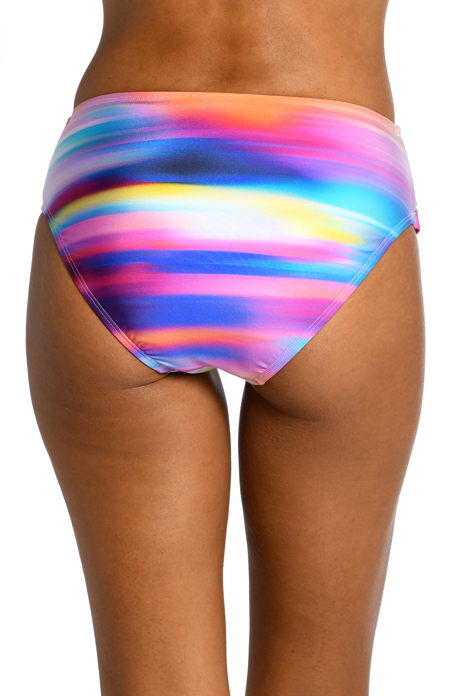 Model is wearing a multi colored ombre printed mid waist bottom from our Sunset Shores collection!