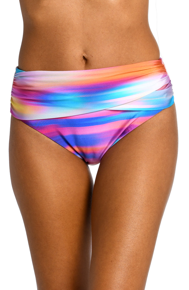 
            
                Load image into Gallery viewer, Model is wearing a multi colored ombre printed mid waist bottom from our Sunset Shores collection!
            
        