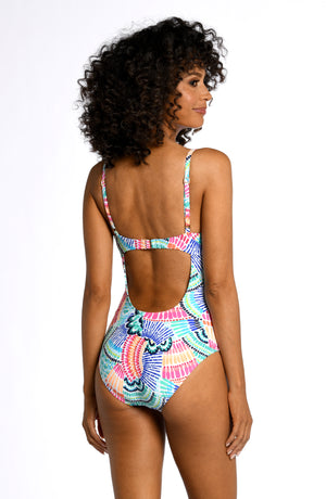 
            
                Load image into Gallery viewer, Model is wearing a multi colored geometric printed keyhole one piece from our Waves of Color collection!
            
        