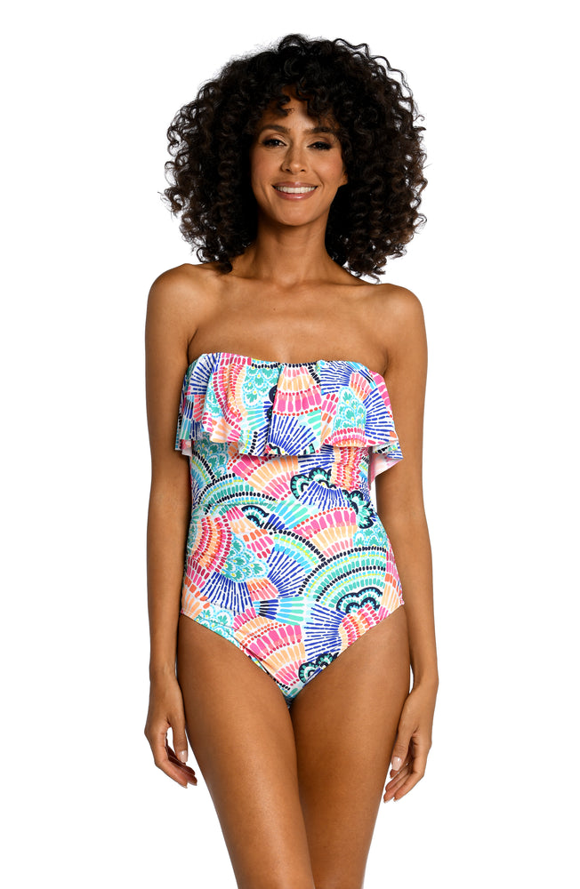
            
                Load image into Gallery viewer, Model is wearing a multi colored geometric printed bandeau one piece from our Waves of Color collection!
            
        