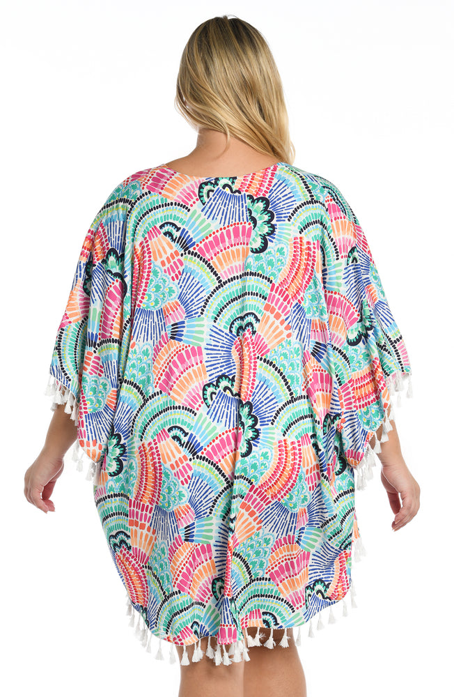 
            
                Load image into Gallery viewer, Model is wearing a multi colored geometric printed kimono cover up from our Waves of Color collection!
            
        