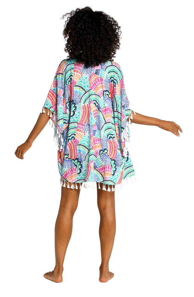 
            
                Load image into Gallery viewer, Model is wearing a multi colored geometric printed kimono cover up from our Waves of Color collection!
            
        