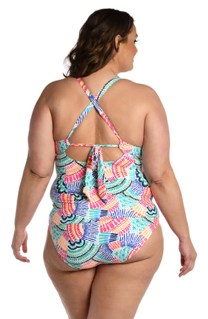 
            
                Load image into Gallery viewer, Model is wearing a multi colored geometric printed tankini top from our Waves of Color collection!
            
        