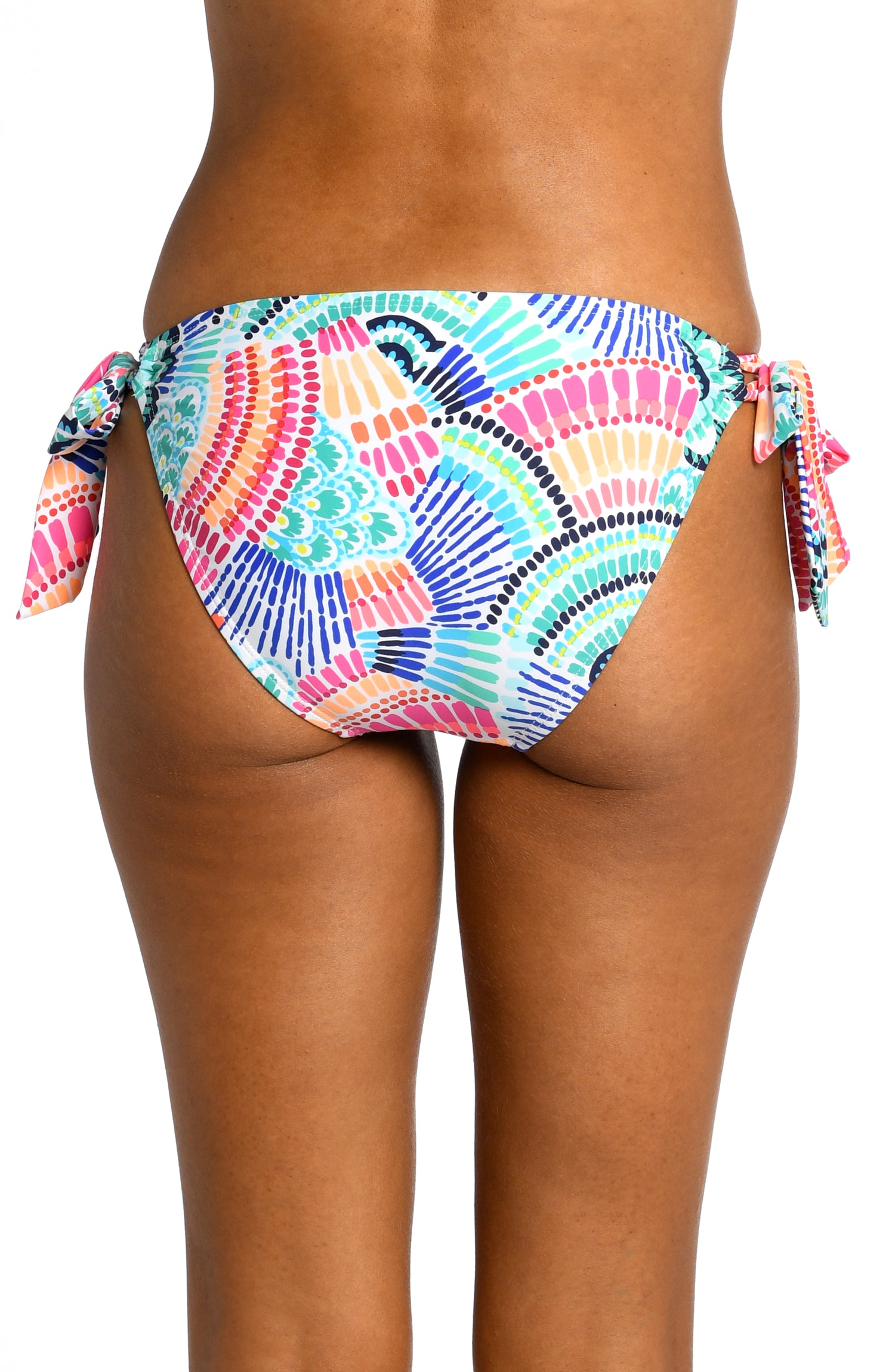 Model is wearing a multi colored geometric printed side tie hipster bottom from our Waves of Color collection!