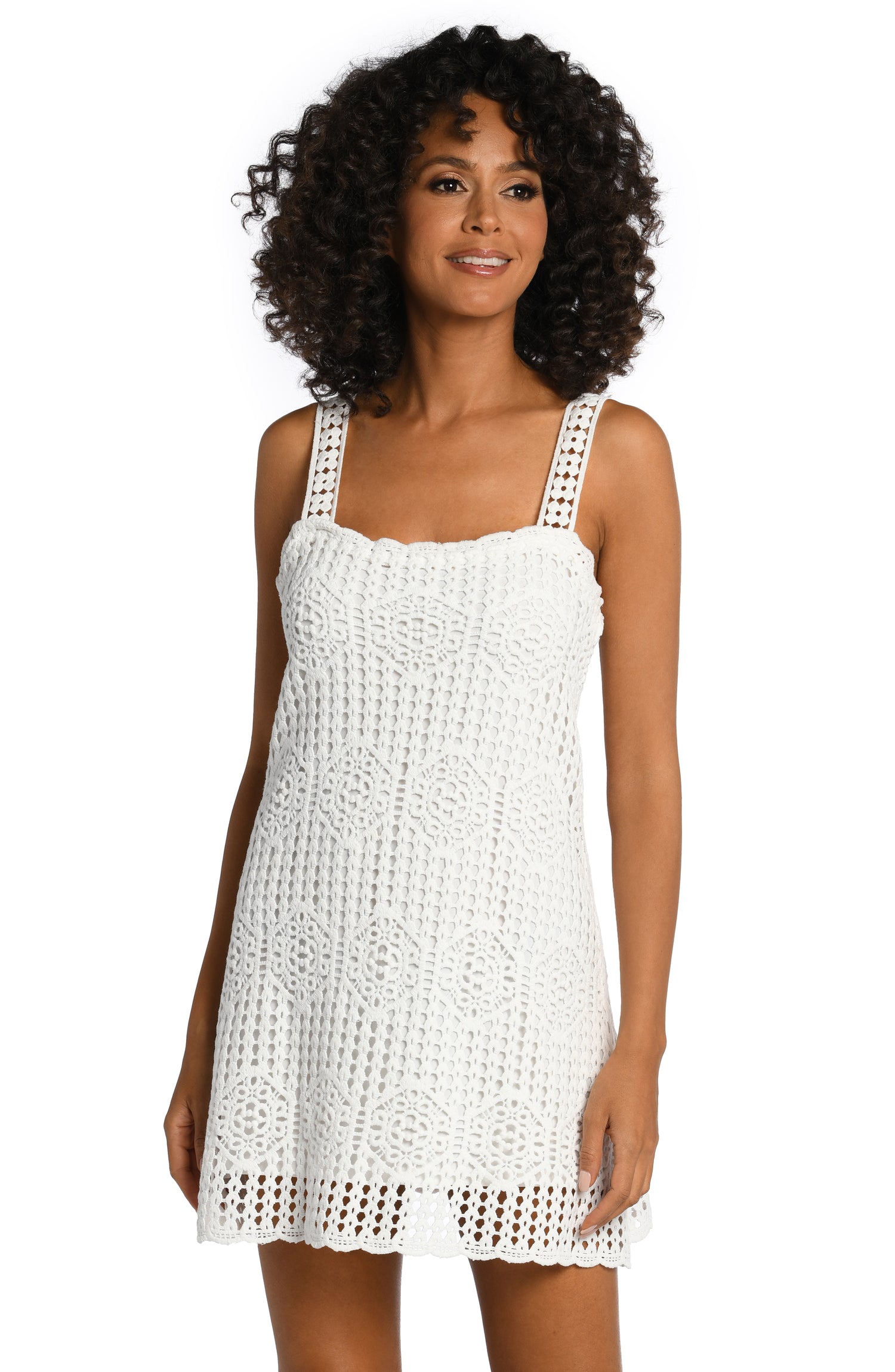 Model is wearing an ivory colored crochet tank dress cover up from our Waverly Covers collection!