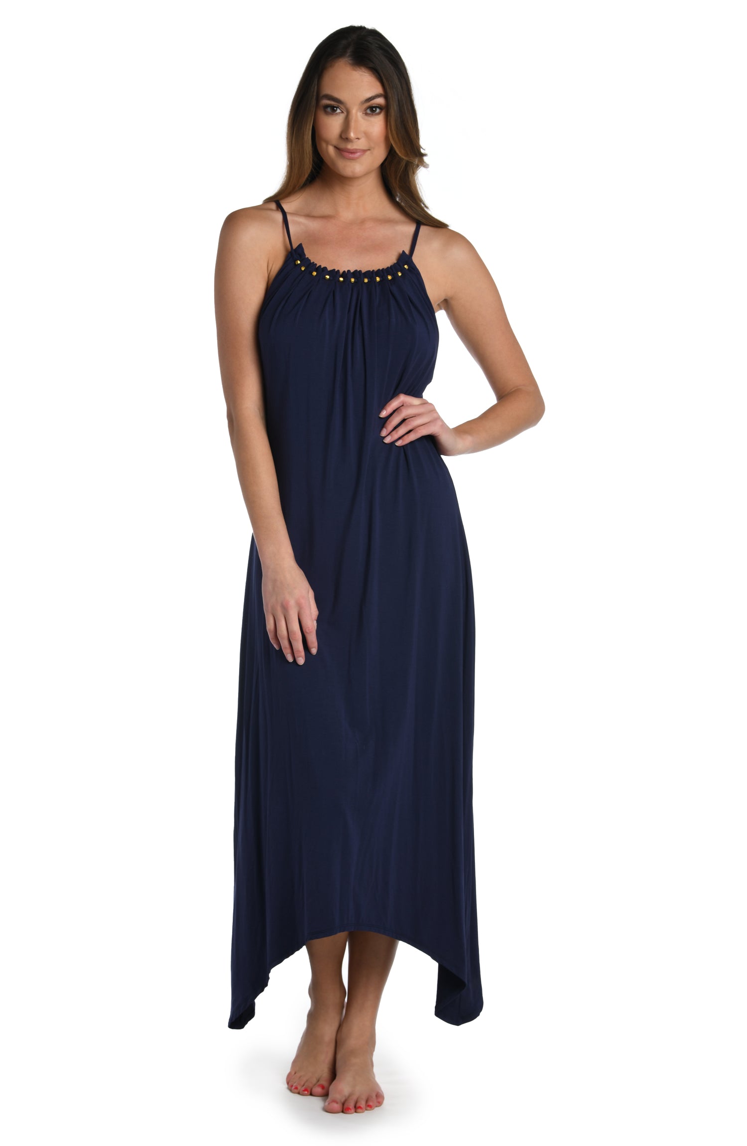 Model is wearing a deep indigo colored halter midi dress cover up from our Beaded Covers collection!