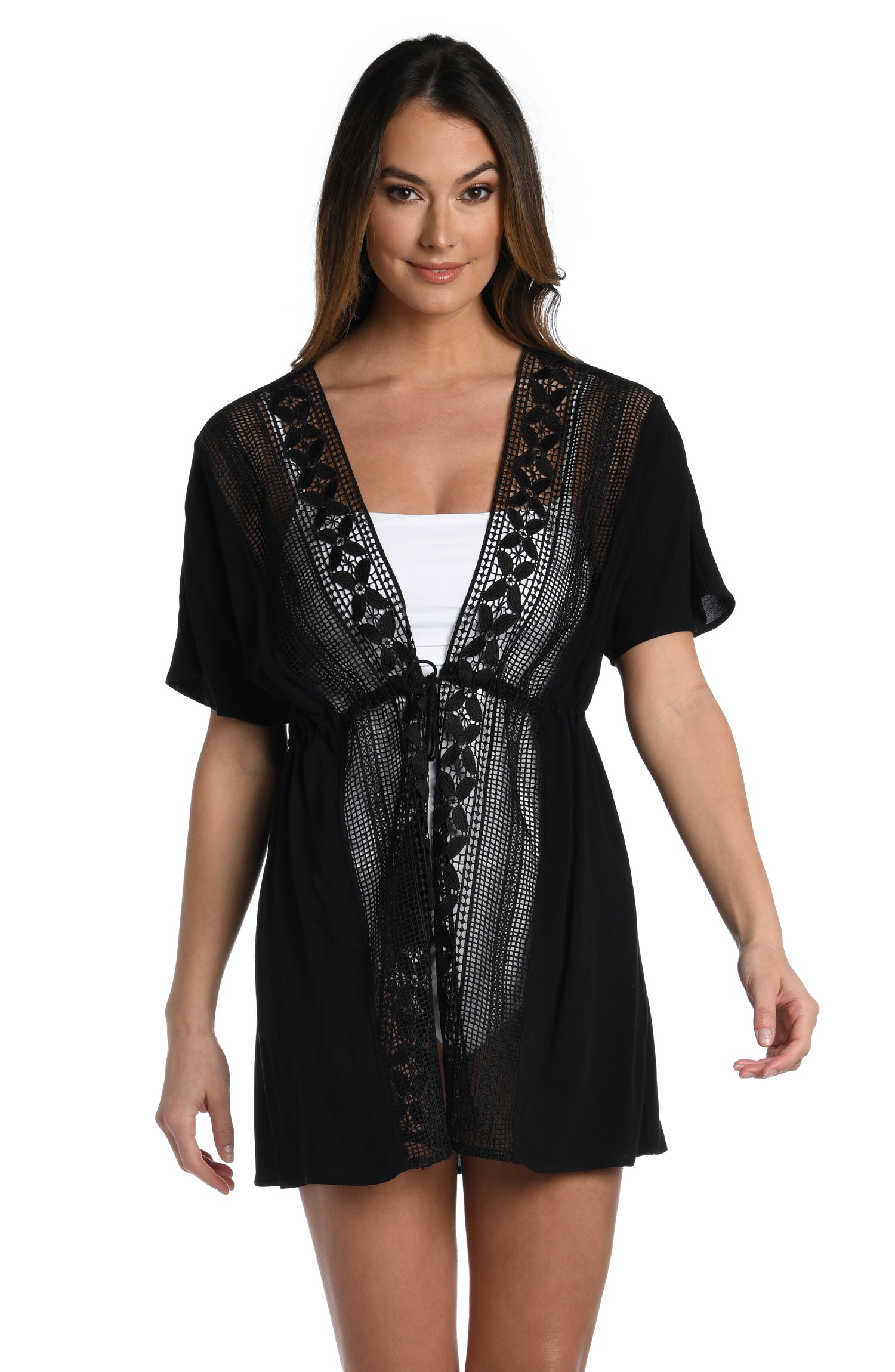 Model is wearing a crochet detailed pattern on this black kimono cover up from out Coastal Covers collection!