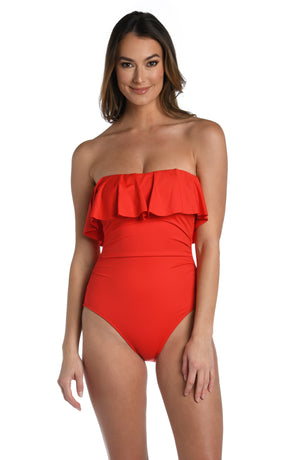 
            
                Load image into Gallery viewer, Model is wearing a cherry colored one piece swimsuit from our Best-Selling Island Goddess collection.
            
        