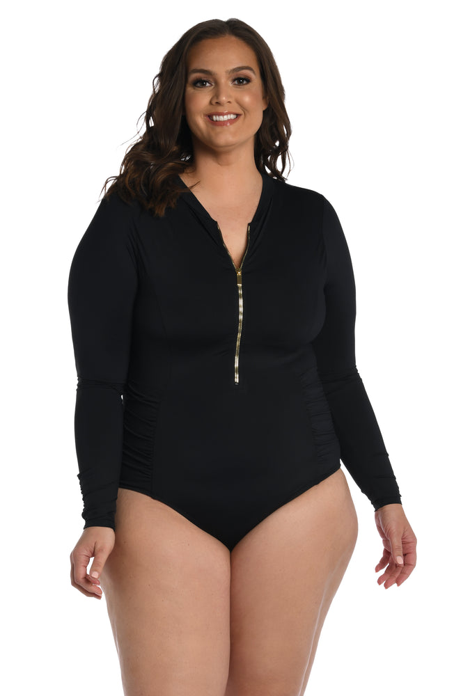 Model is wearing a black paddle suit one piece from our Best-Selling Island Goddess collection.