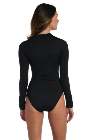 Model is wearing a black paddle suit one piece from our Best-Selling Island Goddess collection.