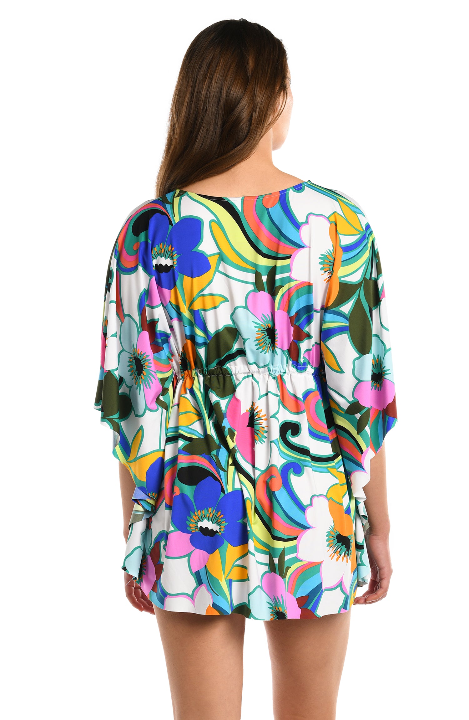 Model is wearing a multicolored bold floral printed v neck caftan cover up from our Sun Catcher collection. 