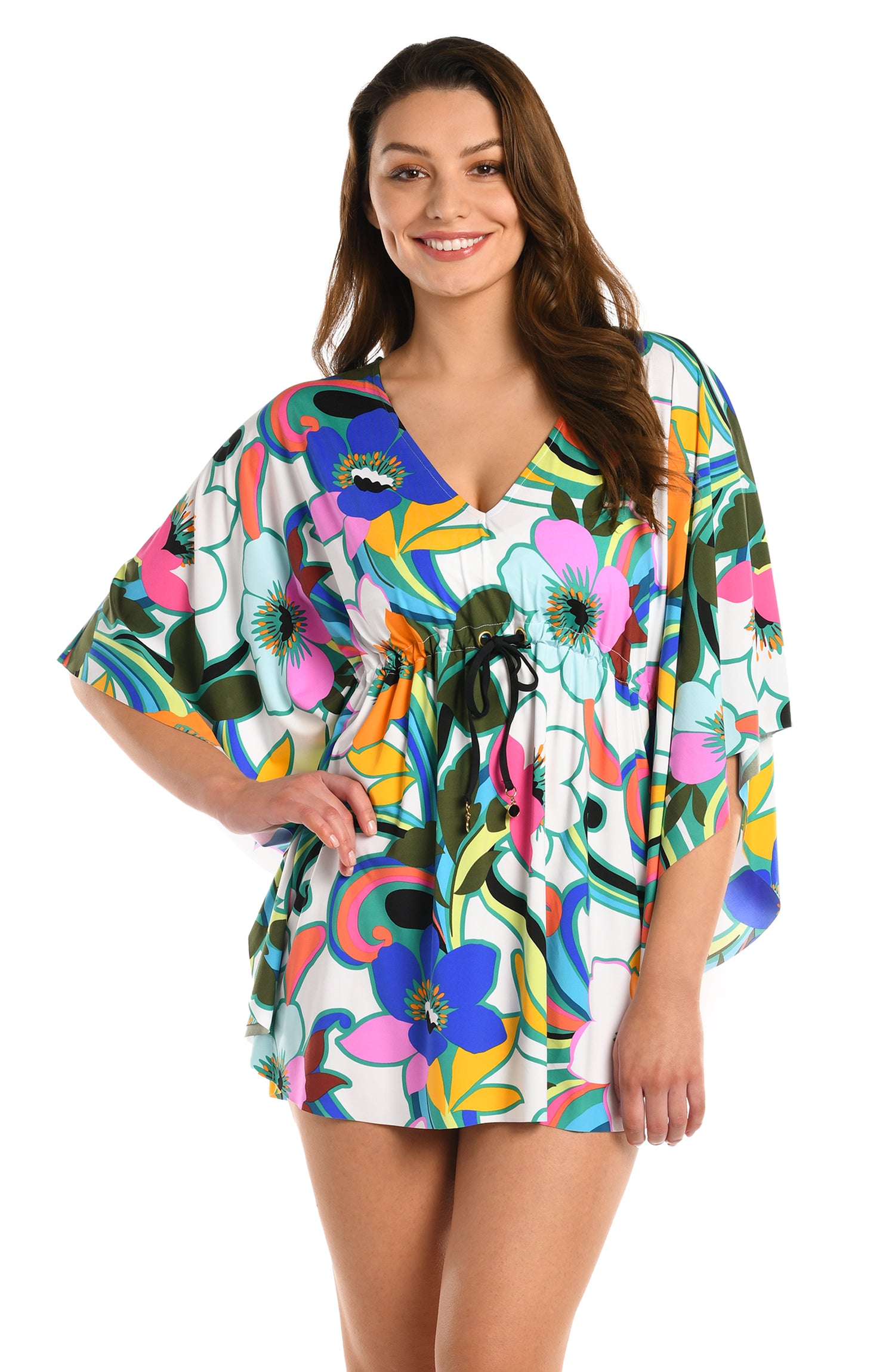 Model is wearing a multicolored bold floral printed v neck caftan cover up from our Sun Catcher collection. 