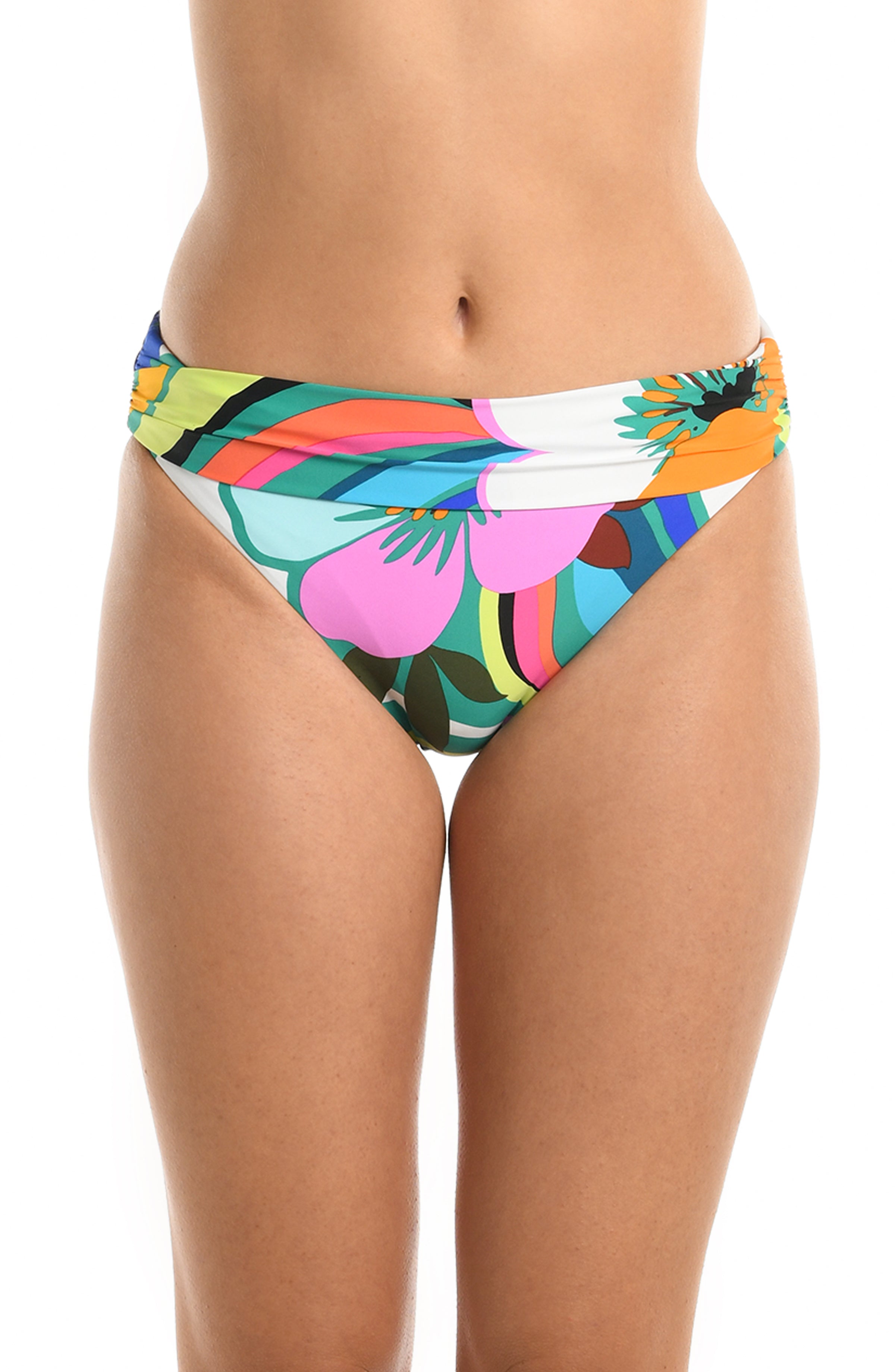 Model is wearing a multicolored bold floral printed shirred band hipster bikini bottom from our Sun Catcher collection. 