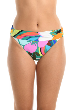 Model is wearing a multicolored bold floral printed shirred band hipster bikini bottom from our Sun Catcher collection. 