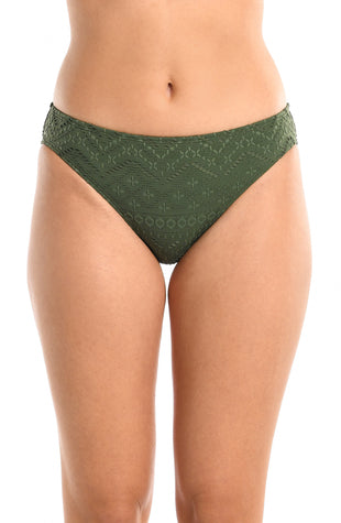 Model is wearing a forest green floral printed hipster bikini bottom from our Saltwater Sands collection.