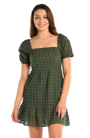 Model is wearing a forest green floral printed short sleeve cover up dress from our Saltwater Sands collection.