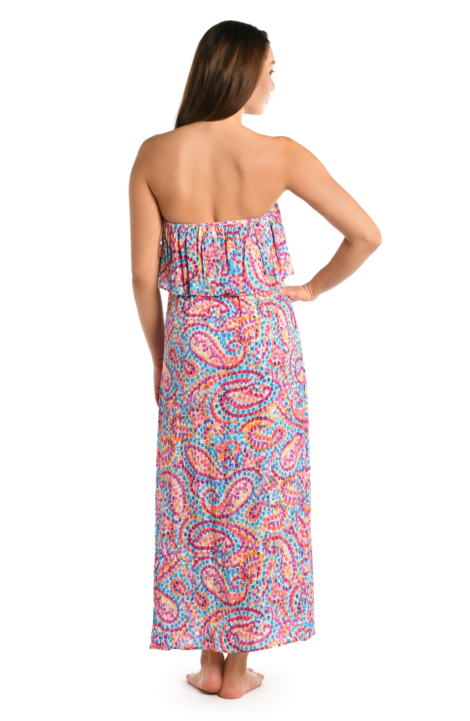 Model is wearing a pink multicolored paisley printed strapless midi dress cover up from our Pebble Beach collection.