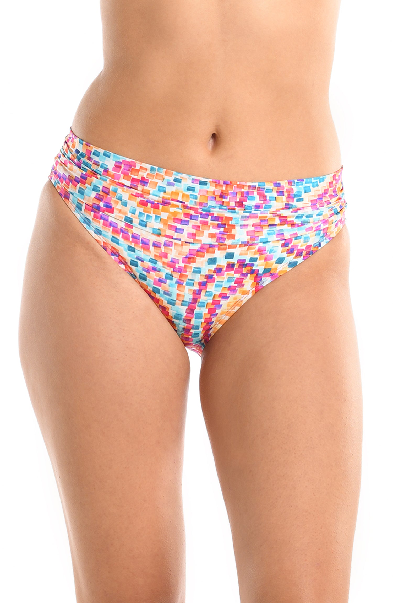 Model is wearing a pink multicolored paisley printed shirred band hipster bikini bottom from our Pebble Beach collection.