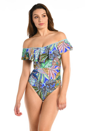 Model is wearing a neon colored off-shoulder one piece swimsuit from our Neon Nights collection!