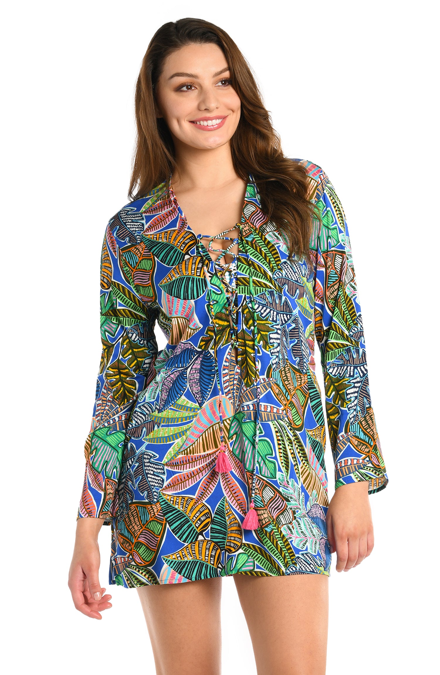 Model is wearing a neon colored printed tunic cover up from our Neon Nights collection!