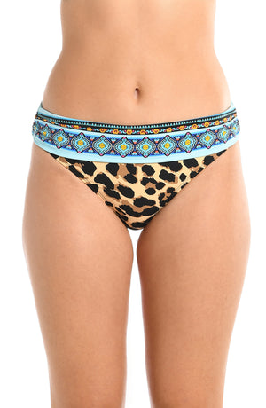 
            
                Load image into Gallery viewer, Model is wearing a dual aqua blue and leopard printed banded hipster bikini bottom from our Running Wild collection.
            
        