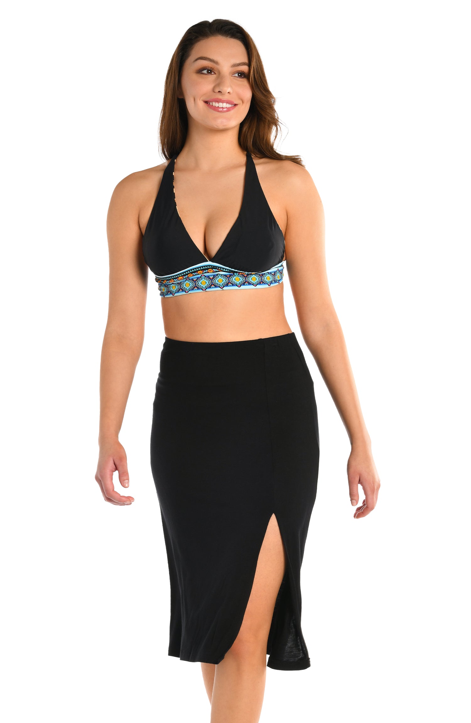 Model is wearing a black midi skirt swimsuit cover up from our Draped Darling collection.