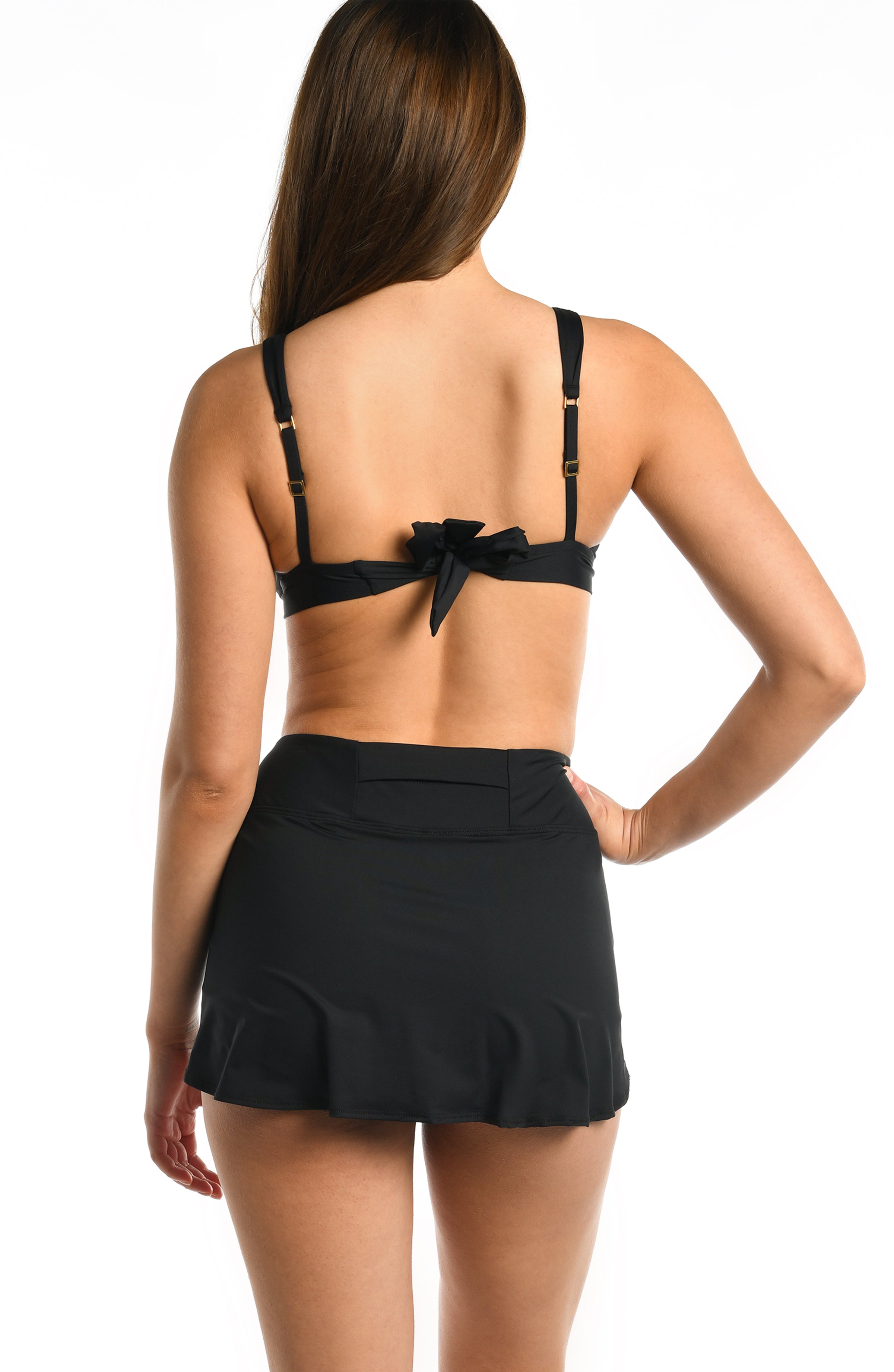 Model is wearing a black skirted swimsuit bottom from our Best-Selling Island Goddess collection.