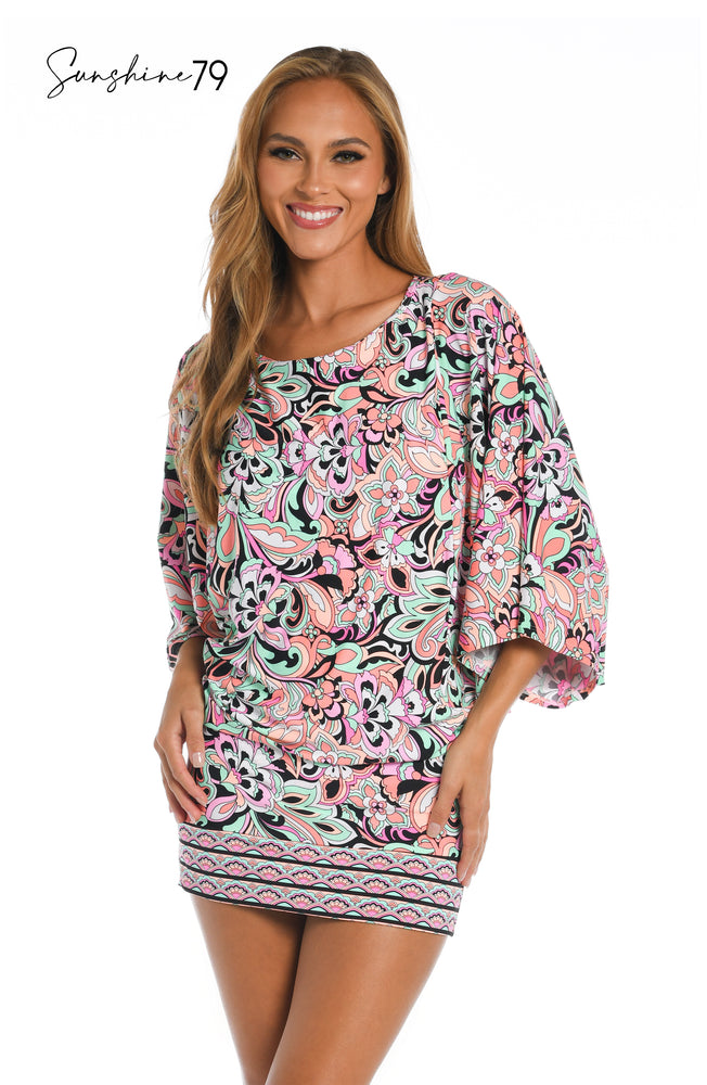 
            
                Load image into Gallery viewer, Model is wearing a pink multicolored paisley printed scoop neck tunic cover up from our Sunshine 79 brand.
            
        