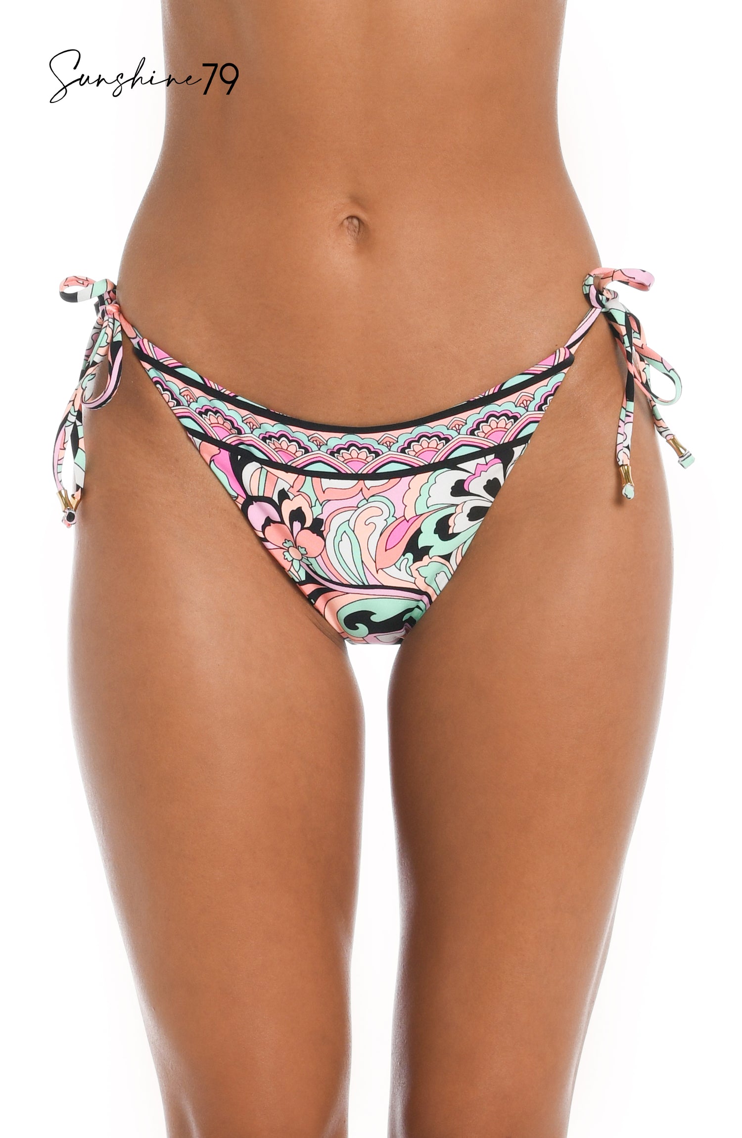 Model is wearing a pink multicolored paisley printed string tie side hipster bikini bottom from our Sunshine 79 brand.